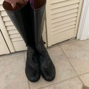 Beautiful pair of tall black Frye boots, worn a few times. Cute snap details.